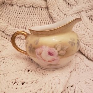 Vintage Austria MUB creamer pitcher. Pink floral with gold trim.